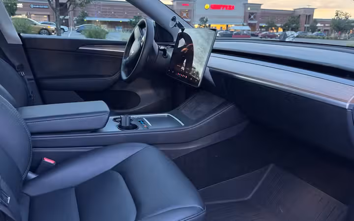 2023 Tesla Model Y Long Range AWD in Solid Black, Front Seats